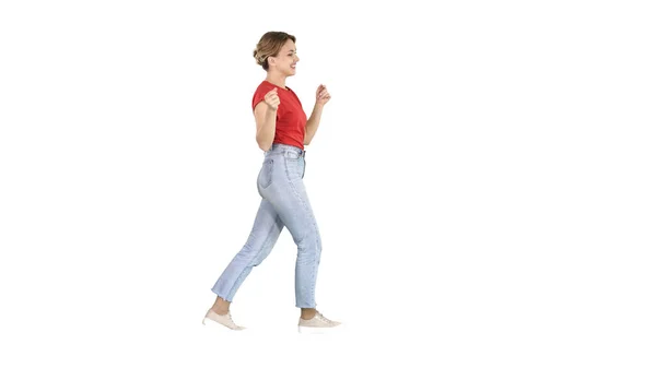 Gelukkig glimlachende vrouw dansen en plezier hebben op witte achtergrond. — Stockfoto