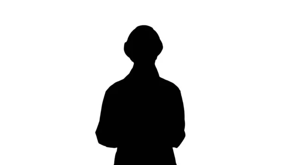 Silhouette Una joven mujer hermosa ingeniera científica en blanco dando una conferencia. — Foto de Stock