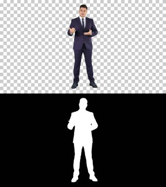 Yakışıklı iş adamı kameraya bakıyor ve konuşuyor, Alpha Channel.