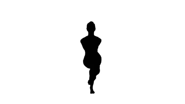 Silhouette Junge Frau in der Adler-Yoga-Pose. — Stockfoto