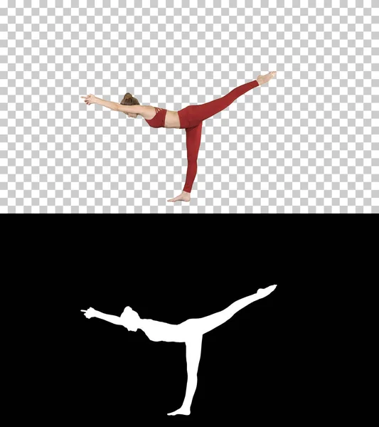 Tuladandasana oder Balancing Stick Pose ist eine fortgeschrittene Yoga-Haltung, die von der schönen Yogi-Frau Alpha Channel gemacht wurde — Stockfoto