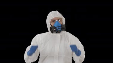 Hazamat kostümlü erkek doktor zafer işaretleri yapıyor, Alfa Kanalı.