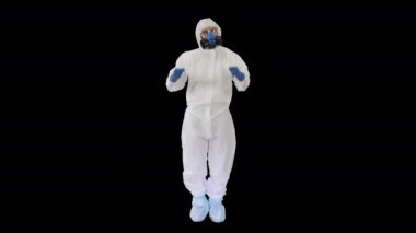 Hazamat kostümlü erkek doktor zafer işaretleri yapıyor, Alfa Kanalı.