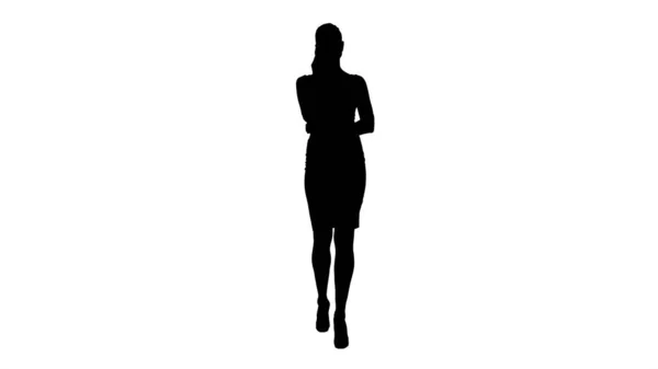 Silhouette donna d'affari con telefonate e passeggiate. — Foto Stock