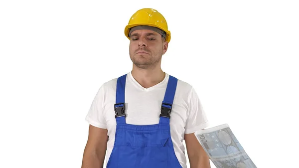 Construction worker getting paid for the work in euros Happy to be paid on white background. — Stock Photo, Image