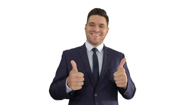 Homem de negócios feliz segurando polegares no fundo branco. — Fotografia de Stock