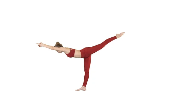 Tuladandasana ή Balancing Stick Pose είναι μια προηγμένη στάση γιόγκα από όμορφη γυναίκα γιόγκι σε λευκό φόντο. — Φωτογραφία Αρχείου