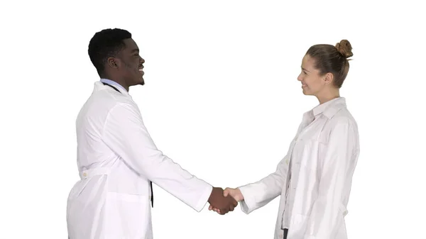 见到你很高兴医生们在白种人的背景下相遇握手. — 图库照片