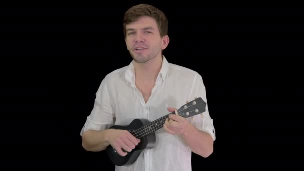 Man with ukulele singing a song, Alpha Channel — Stok Video