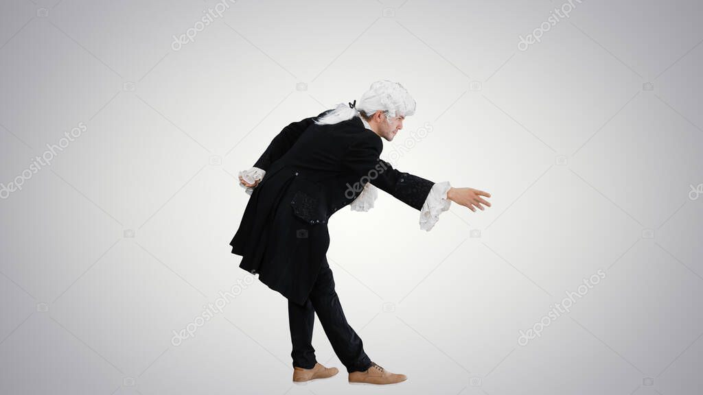 Man dressed as Mozart greeting someone on gradient background.