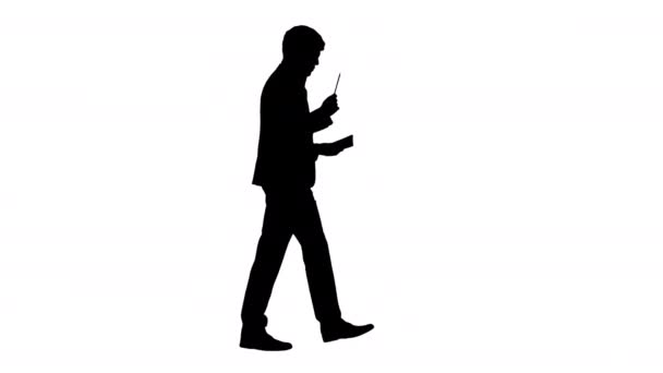 Silhouette Businessman camminare e scrivere le sue idee. — Video Stock