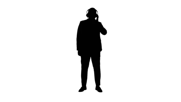 Silhouette Handsome Afro American businessman in headphones is l — Stock Photo, Image