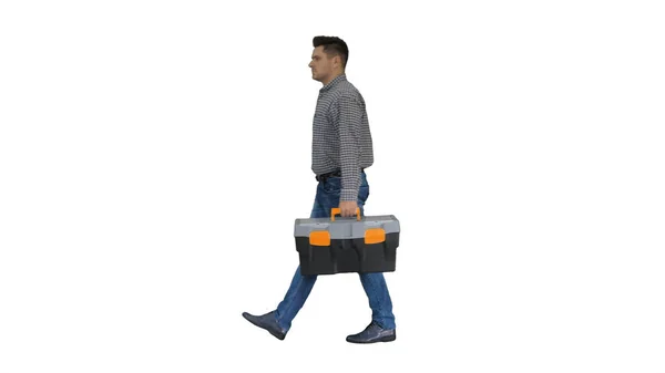 Concepto de reparador profesional Handyman caminando con caja de herramientas sobre fondo blanco. —  Fotos de Stock