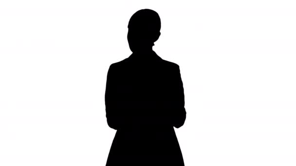 Silhouette Disapprovingly looking business woman using her phone. — Stock Video