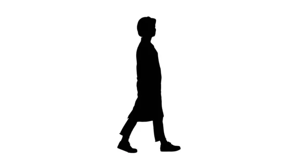Silhouette Engineer mujer caminando y comprobando el objeto. —  Fotos de Stock