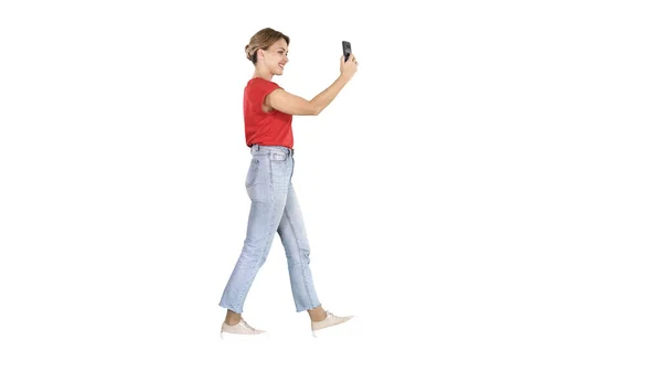 Young cute lady is having video call on her phone Video blog on — Stock Photo, Image