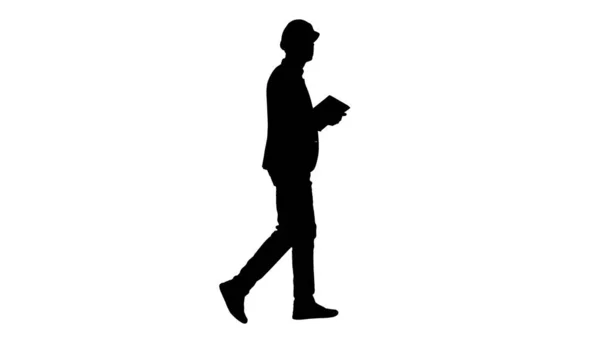 Silhouette Architect walking with tablet and checking what is built. — Stock Photo, Image