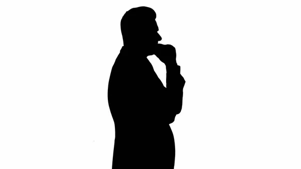 Silhouette Senior white businessman looking and checking out the — Stock Photo, Image