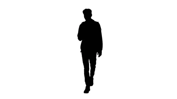 Silhouet Jonge man in casual kleding tekst berichten op cel ph — Stockfoto