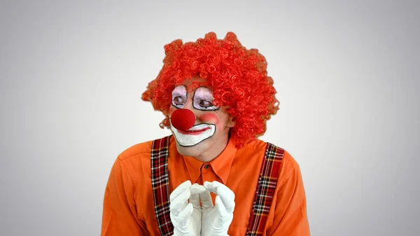 Cunning clown is up to something Having a plan on gradient backg — Stock Photo, Image