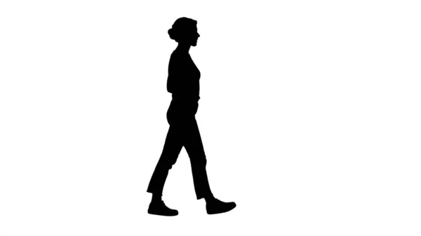 Silhouette Fit girl hält ihre Hände in den Taschen der weißen Jeans — Stockfoto