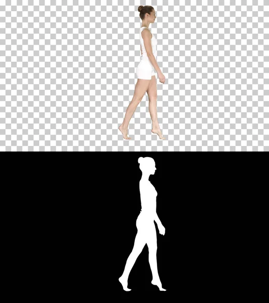 The young woman walking on her tip-toes, Alpha Channel — Stock Photo, Image