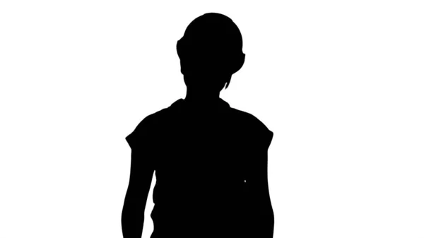 Silhouette Young construction woman in hardhat walking. — Stock Photo, Image