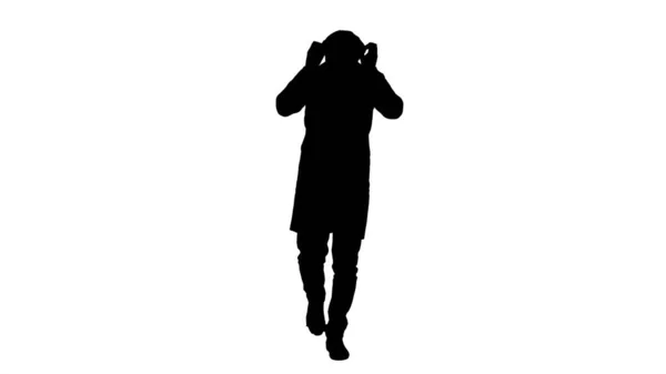 Silhouette Camminando bel medico indossando maschera e cappuccio. — Foto Stock
