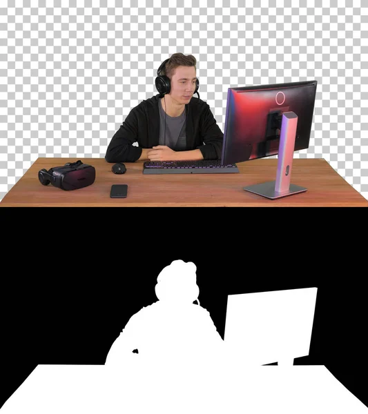 Young man gamer having a video call on pc, Alpha Channel with Si — Stock Photo, Image