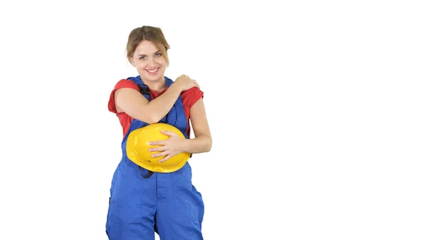 Mujer de la construcción riendo de alguien detrás de la cámara en whit — Foto de Stock