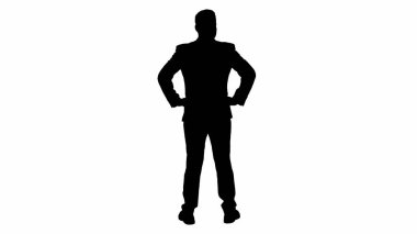 Siluet işadamı elleri kalçasında etrafa bakıyor..