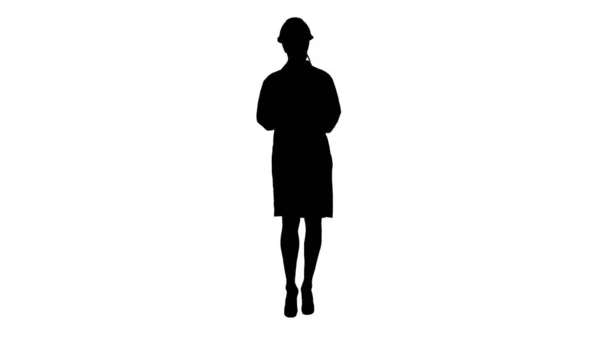 Silhouette Woman engineer writing checklist walking. — Stock Photo, Image