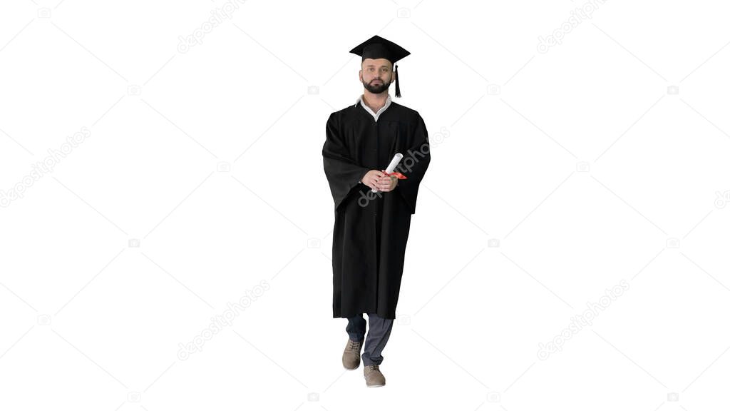 Excited graduate student walking with diploma on white backgroun