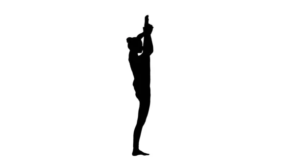 Sylwetka Młoda kobieta jogi praktykujących koncepcję jogi, Variation o — Zdjęcie stockowe