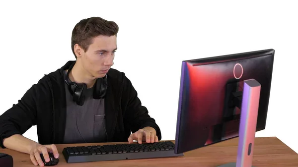 Gamer playing a video game on personal computer on white backgro — Stock Photo, Image