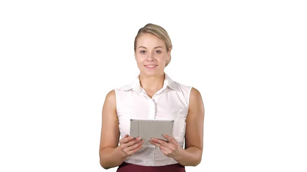 Beautiful girl holding a tablet touch pad computer gadget swipin — Stock Photo, Image