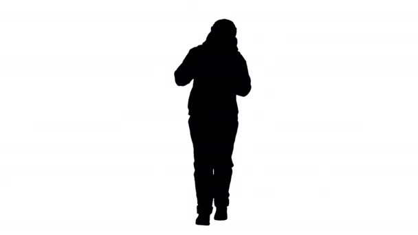 Silhouette Teenager περπάτημα και την απογείωση ιατρική μάσκα. — Αρχείο Βίντεο