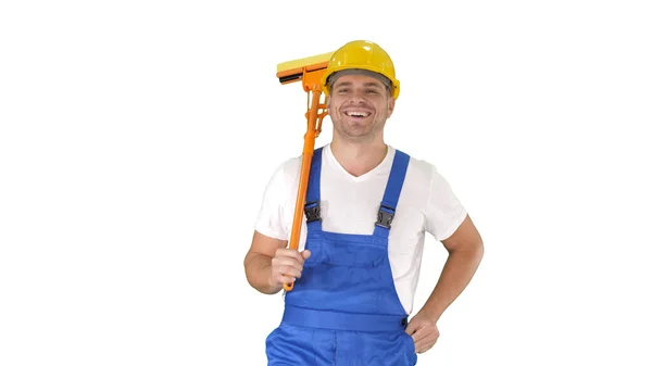 Housecleaner en casco caminando con una fregona sobre fondo blanco. — Foto de Stock