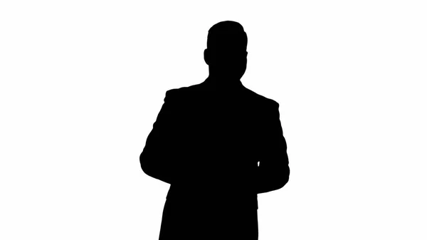 Silhouette Man in suit walking and counting money. — Stock Photo, Image