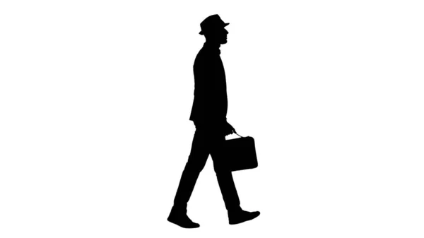 Homem silhueta em passeio casual com pasta. — Fotografia de Stock