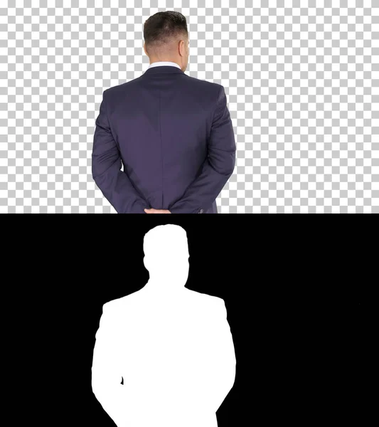 ビジネスマンは歩き回って手を後ろに向ける — ストック写真