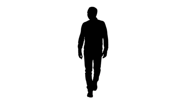 Силуэт Расслабленный случайный человек в джинсах и рубашке ходьба и туалет — стоковое фото