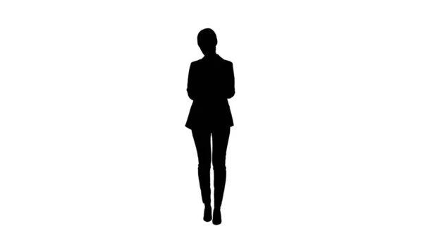 Silhouette femminile casual in un abito sms sul suo telefono. — Foto Stock