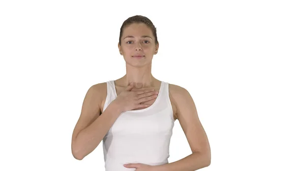 Mujer feliz respirando profundamente haciendo ejercicio sobre fondo blanco. — Foto de Stock