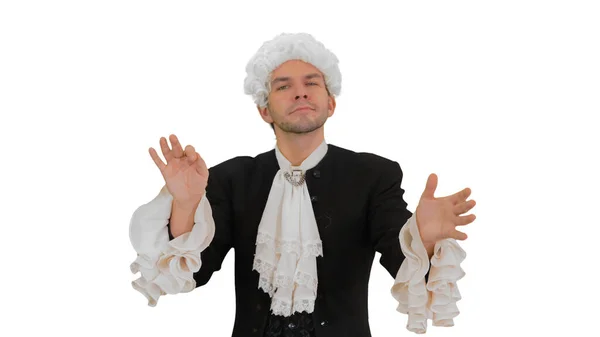 Man dressed like Mozart conducting expressively while looking at — Stock Photo, Image