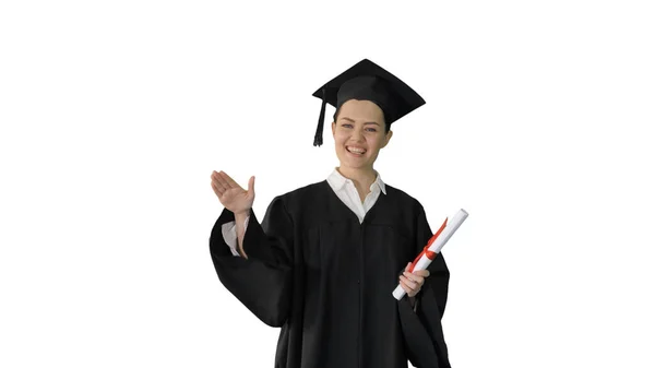 Graduada femenina enérgica caminando con diploma y dando motivo —  Fotos de Stock