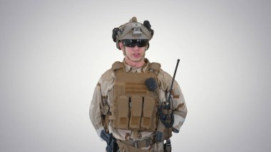 US Military Soldier in Uniform Reports on gradient background. clipart