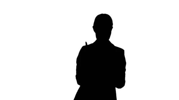 Silhouette Femme concentrée dans un costume écrivant des idées d'affaires i — Photo