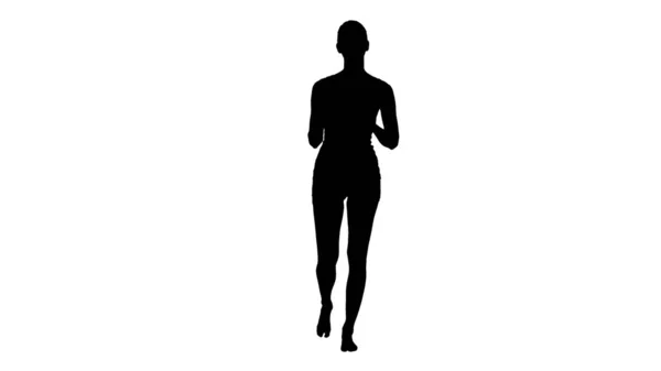 Silhouet Mooie vrouw in wit ondergoed lopen en t — Stockfoto