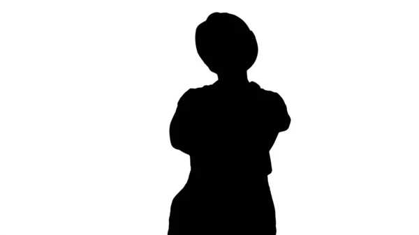 Silhouette Costruttore sorridente donna in piedi e cambiamentoin piedi — Foto Stock